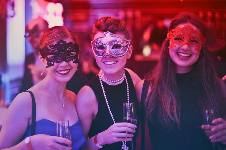 masked party goers