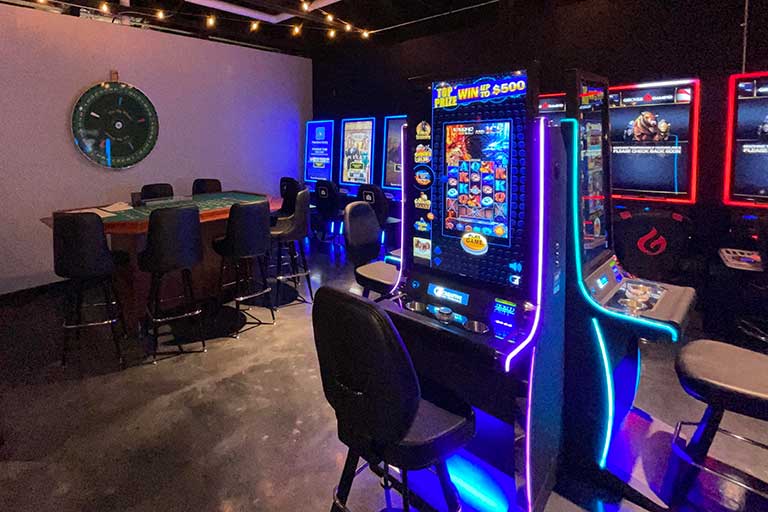 Gaming Room with Black Jack and Slot Machines