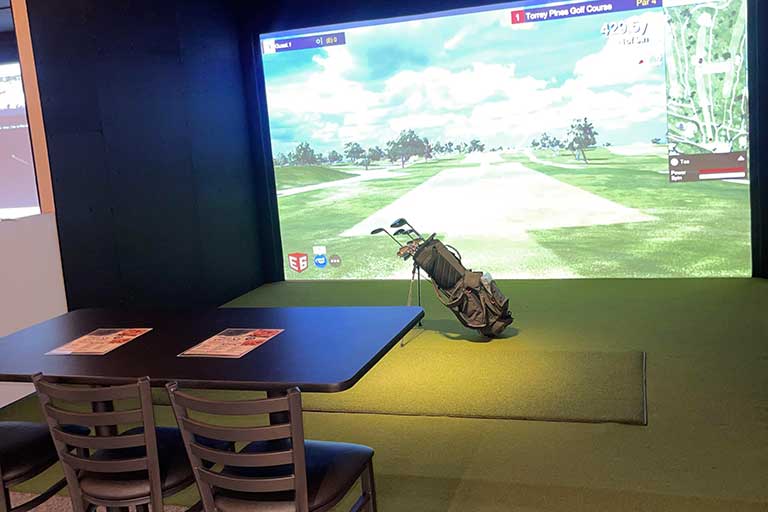 golf simulator at central station in mandan, north dakota